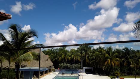Time-lapse-clouds-passing-by-in-a-tropical-weather-in-Florida-seen-from-a-balcony