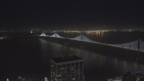 Aerial-view-of-a-lit-up-city-bridge