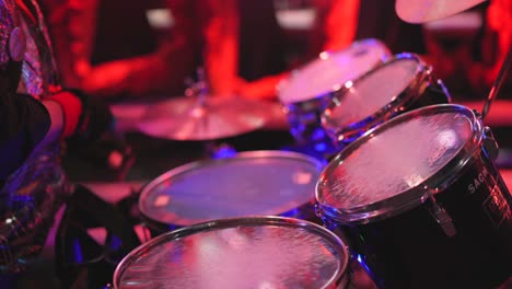 Close-Up-Of-The-Drummer's-Hands-And-Sticks-At-The-Concert-during-party-festival