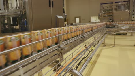 Wide-angle-of-drink-plant-conveyor-belt-in-factory,-no-people