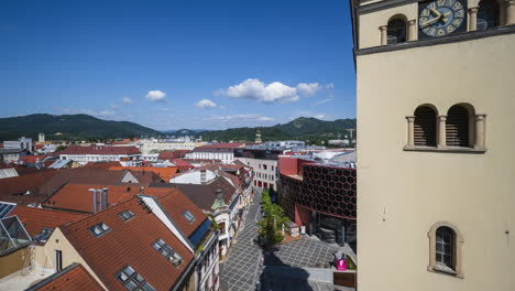 Panorama-Motion-Time-Lapse-of-Žilina-City,-Slovakia-viewed-from-Burian's-Tower-on-summer-sunny-day