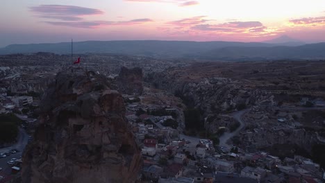 Drone-passes-by-Ortahisar-Castle-during-sunrise