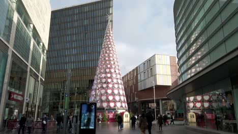Christmas-shopping-people-walking-urban-Liverpool-city-Christmas-tree-wearing-corona-virus-masks