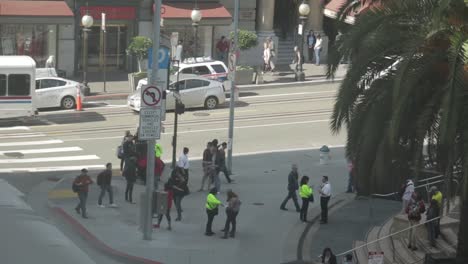fast-time-lapse-of-people-walking-the-crowded-streets-of-San-Francisco-while-cars-pass-by