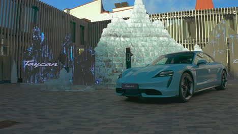 Frozen-blue-color-Porsche-Taycan-Turbo-S-charging-showroom