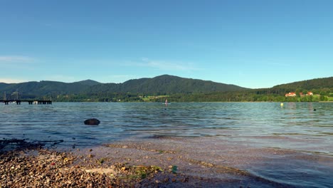 Beautiful-Tegernsee---the-popular-lake-in-the-bavarian-pre-alp-region-is-a-hotspot-for-stand-up-paddeling-and-get-a-refreshment-at-summertime,-exemplary-shown-by-this-video