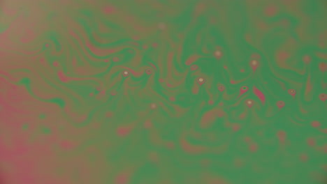 Grüne-Und-Rosa-Flüssigkeit,-Die-Verschiedene-Organische-Formen-Und-Gestalten-Bildet