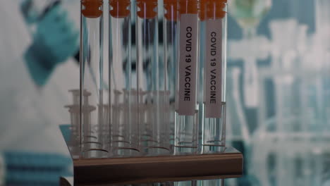Coronavirus-Covid-19-Test-Tube-Vials-Being-Placed-Into-Rack