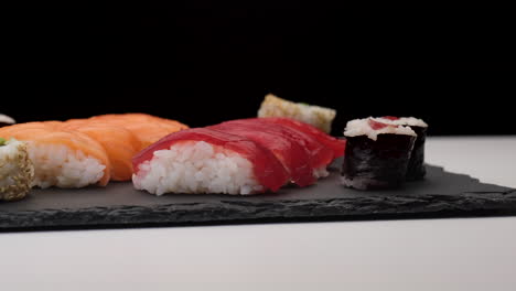 Sushi-assortment-rotating-on-a-plate