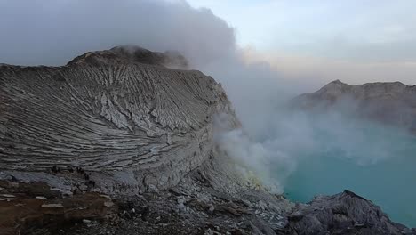 Steam-Pouring-Out-from-Blue-Lava-at-Mount-Ijen-in-the-morning