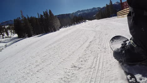 POV-of-snowboarder-going-down-the-slopes