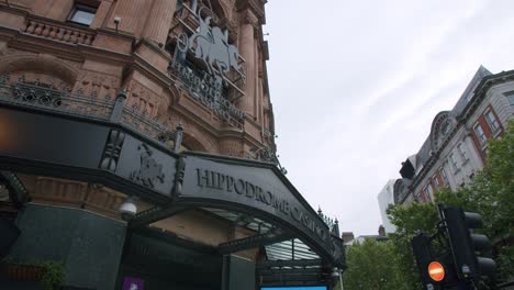 Slow-motion-gimbal-pan-of-London's-Hippodrome-Casino-building,-Leicester-Square