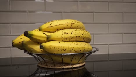 Wide-Panning-Shot-of-Spotted-Ripe-Bananas