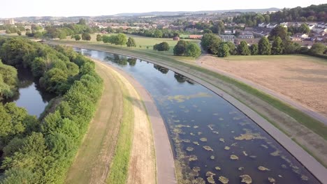 Aerial-drone-footage-of-a-flood-prevention-system-in-Exeter,-England