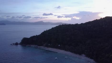 Aerial-view-of-tropical-island-in-the-Philippines-at-daybreak---camera-pedestal-down