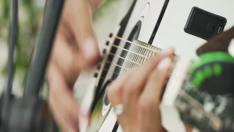 Close-up-of-guitar-playing