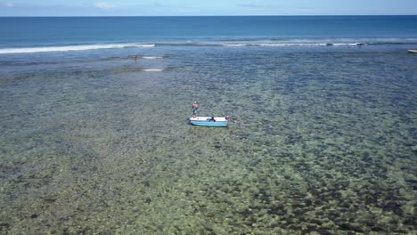drone-shot-circling-around-a-fisherman-in-Mauritius-island