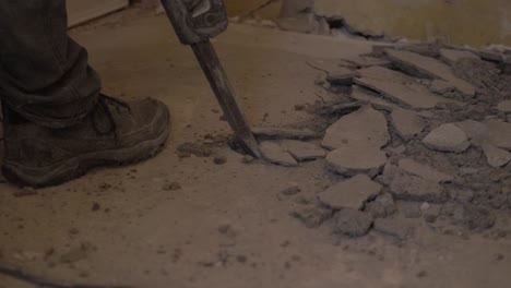 Using-kango-hammer-to-break-up-old-concrete-floor-SLOW-MOTION