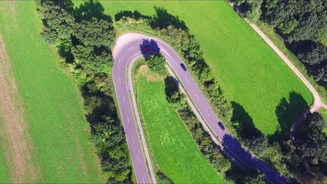 A-Birdseye-shot-of-heavy-curved-road---Nationalpark-Eifel