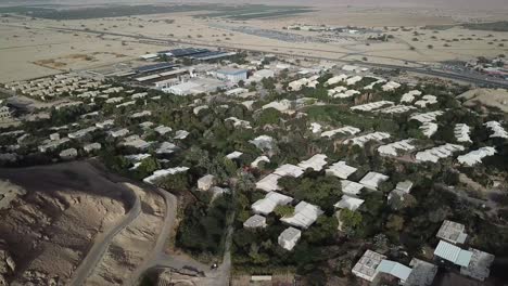 Aerial:-top-view-of-the-small-village-of-Yotvata-in-the-middle-of-the-desert,-Israel