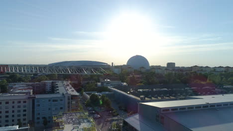 Aerial-dolly-shot-of-Ericsson-Globe-from-afar-on-a-sunny-day