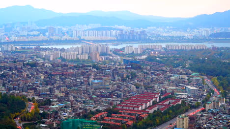 Seoul-South-Korea---Circa-time-lapse-zoom-out-wide-shot-of-Seoul-downtown-city-and-traffic,-locked-shot,-daytime