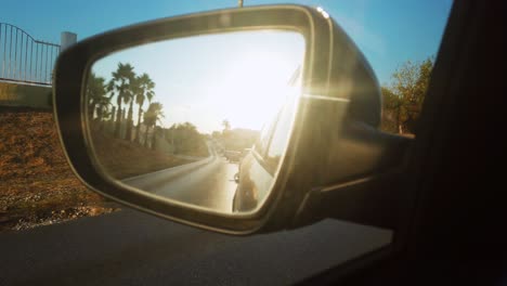 Looking-in-the-rear-view-mirror-at-the-world