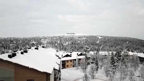 Drone-view-of-a-hotel-in-Saariselka,-Lapland,-Finland