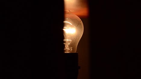 Glowing-yellow-light,-light-bulb,-transition---idea-concept