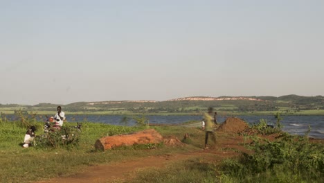A-time-lapse-with-slight-motion-blur-of-Africans-moving-around-Lake-Victoria-in-Africa