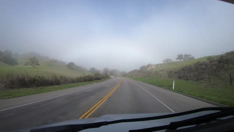 Time-lapse-hyperlapse-driving-through-dense-fog-banks-in-California-hills-in-Los-Padres-National-Forest