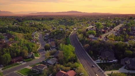 A-floating-drone-shot-over-a-main-road-in-the-suburbs-part-of-Utah