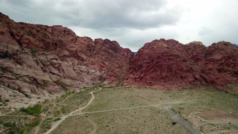 Wide-Aerial-shot-flying-toward-red-rock-outcropping-at-Red-Rock-Canyon-Nevada
