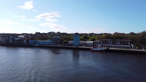 View-of-the-rivershore-as-seen-from-the-ferry-leaving-Newcastle-upon-Tyne,-England
