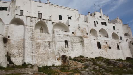 Panoramic-view-on-white-walls-of-Medieval-Town-of-Ostuni-architecture,-Italy