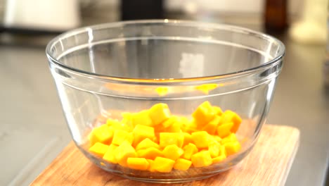 Squash-being-tossed-in-a-bowl-4K