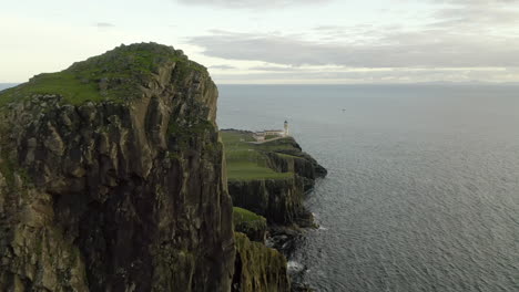 An-aerial,-evening-view-of-Neist-Point-Lighthouse-on-the-Isle-of-Skye