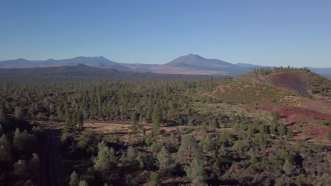 Panoramic-view-from-the-sky-of-Lassen-County-backcountry-road-in-forest-near-defunct-mine