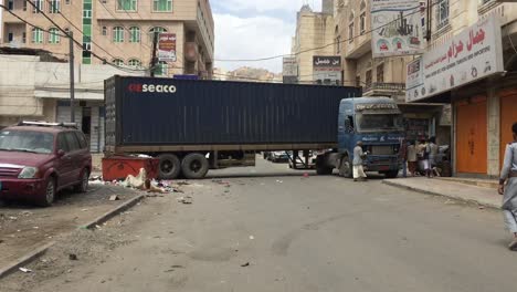 a-big-truck-is-blocking-the-street-because-of-bad-driver-while-carring-container