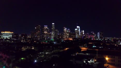 Wide-aerial-shot-of-downtown-Los-Angeles-skyline-at-night
