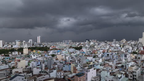 Dramatic-Time-Lapse-of-Storm-clouds-over-terrace-houses,-rooftops-and-narrow-alleyways-of-Binh-Thanh-Vietnam