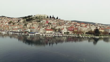 Drone-view,-Croatia,-city-of-Sibenik,-panoramic-view-of-the-old-town-center-and-coast