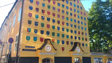 A-shot-of-a-facade-with-all-the-shields-of-Latvia-regions