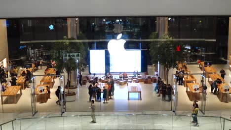 Bangkok,-Thailand---July-30,-2019:-A-lot-of-people-visiting-the-first-official-Apple-store-in-Thailand,-opening-in-the-IconSiam-shopping-mall-located-by-Chao-Phraya-River-in-Bangkok