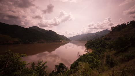 Slow-moving-Mekong-water-dammed-above-the-Xayaburi-Dam,-Laos