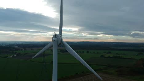 Aerial-rotation-around-wind-turbine-in-British-countryside