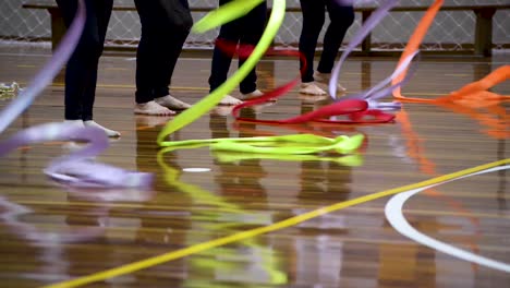 Beautiful-movements-with-rhythmic-gymnastics-tape-done-by-ladies-in-presentation