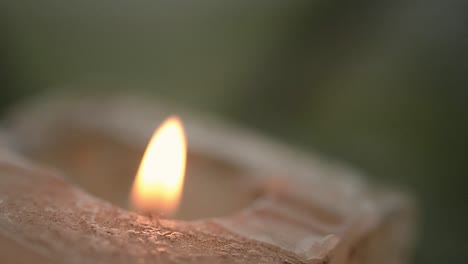 Close-up-of-candle-burning-a-flame