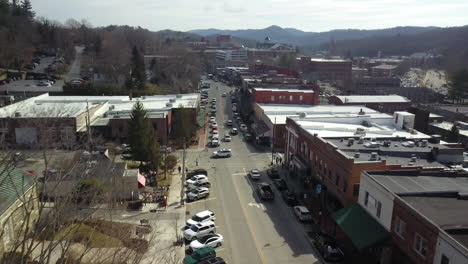 Aerial-pull-out-over-the-Town-of-Boone-North-Carolina-as-fire-truck-enters-the-shot
