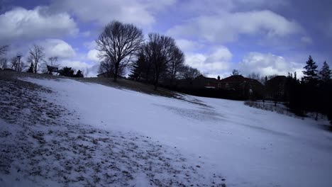Timelapse-of-clouds-moving-across-a-winter-landscape